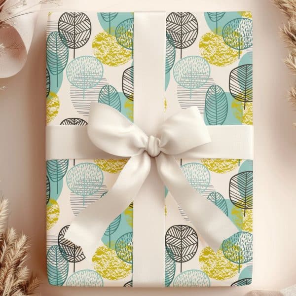 Gift Wrapped With A Cream Ribbon And A Stylized Leaf Pattern In Teal And Gold.