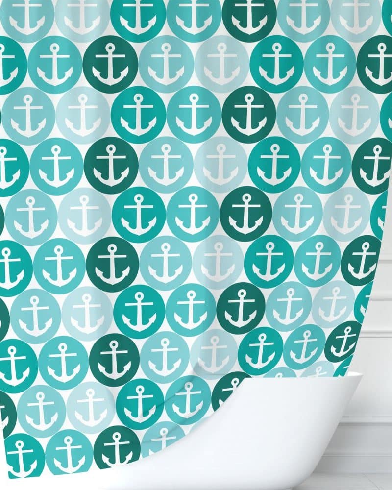 Teal and light blue shower curtain with a repeating pattern of white anchors inside circles.