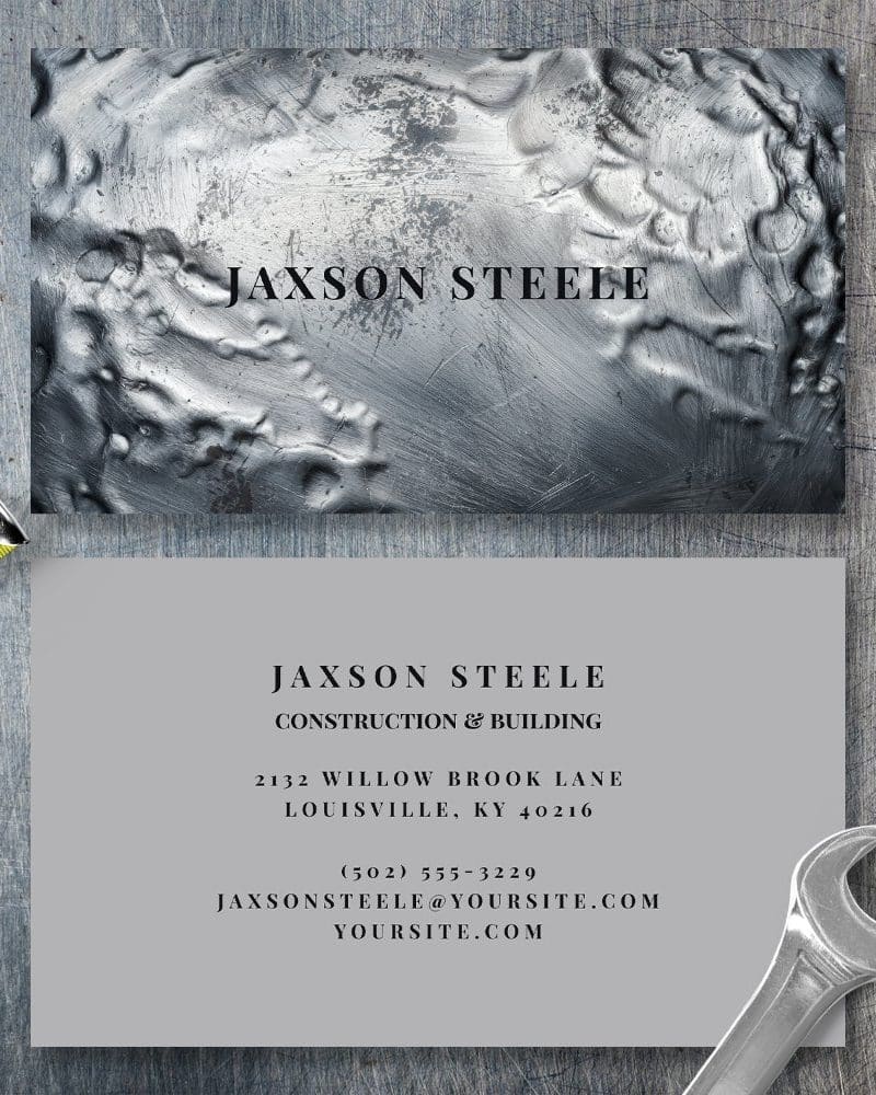 Business card for Jaxson Steele Construction & Building. The card features a metallic textured background.