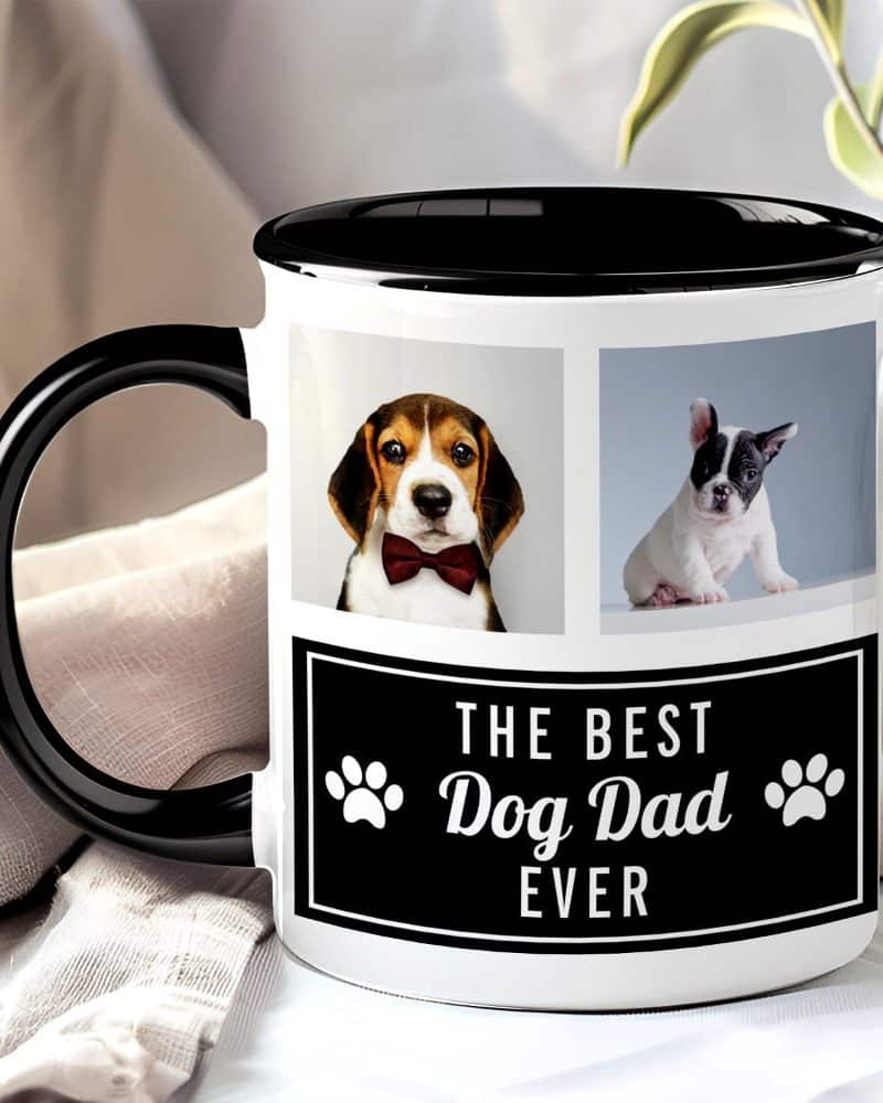 White coffee mug with black handle and rim, featuring photos of two dogs and the text The Best Dog Dad Ever.