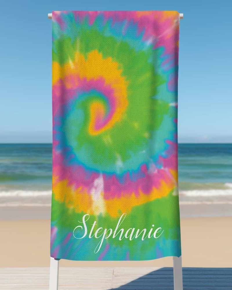 Personalized tie-dye beach towel with the name Stephanie.