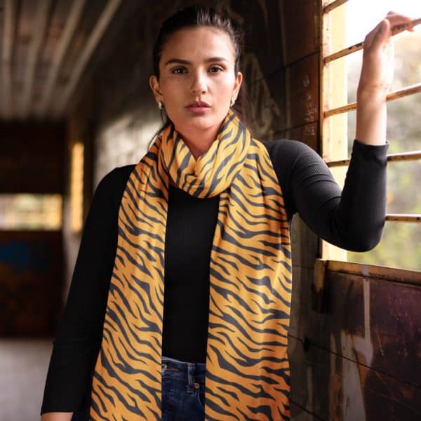 Woman Wearing A Tiger-Striped Scarf.