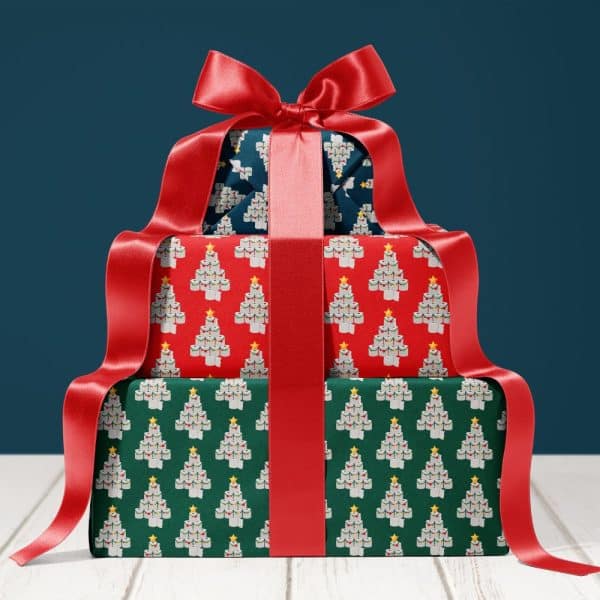 Three Gifts Stacked, Tied With A Large Red Ribbon, Featuring Christmas Trees Made Of Toilet Paper Rolls.