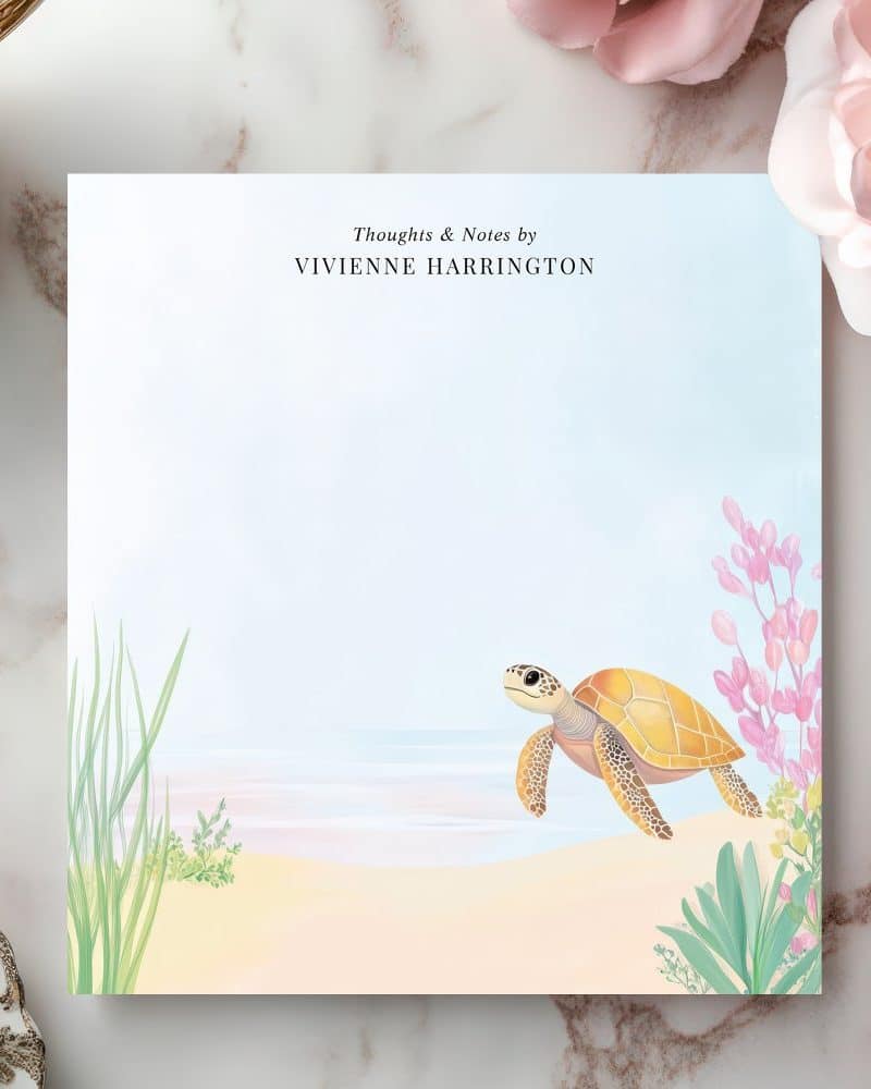 Sea turtle notepad with beach scene and Vivienne Harrington's name.