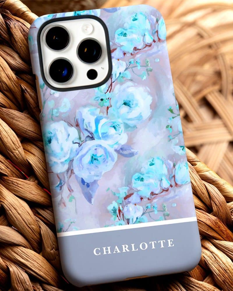 Phone case with light blue floral design and the name Charlotte at the bottom.