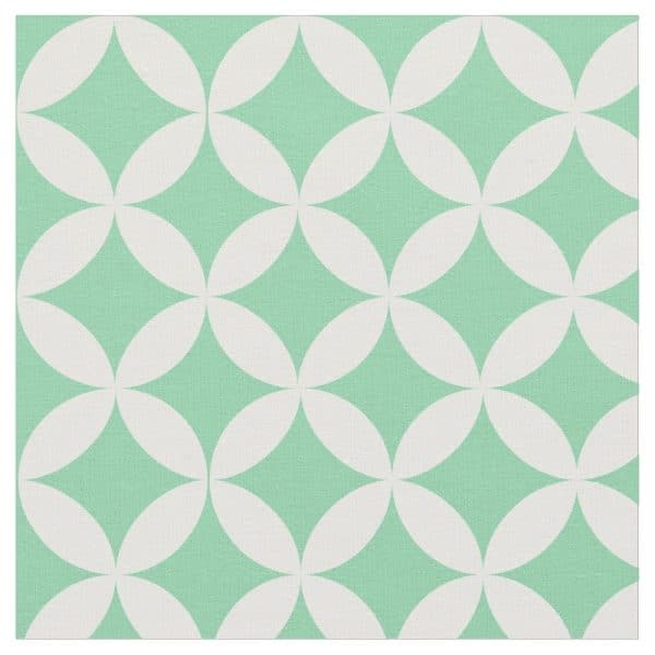 Mint Green Background With A Repeating Pattern Of Off-White Overlapping Circles Forming Diamond Shapes.
