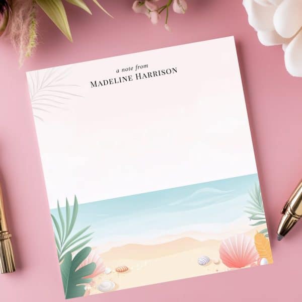 Personalized Stationery Featuring A Beach Scene With Seashells And Palm Leaves At The Bottom. The Top Displays Madeline Harrison'S Name.