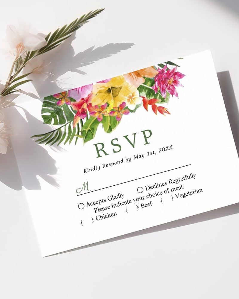 Wedding RSVP card with tropical floral design.