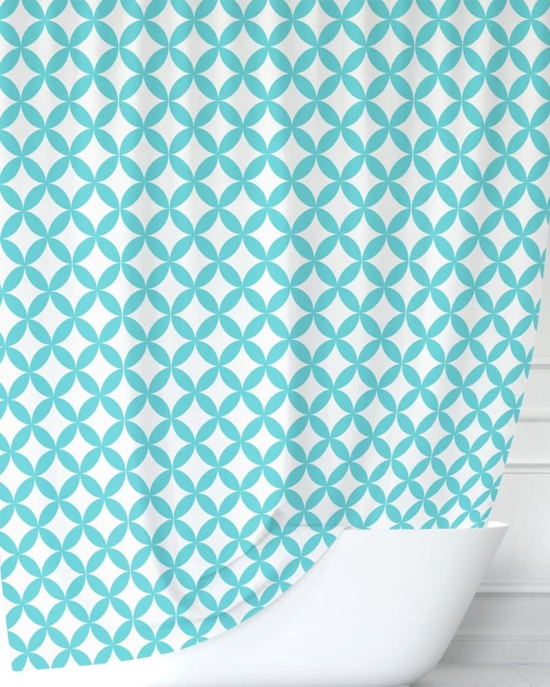 Teal and white geometric patterned shower curtain.