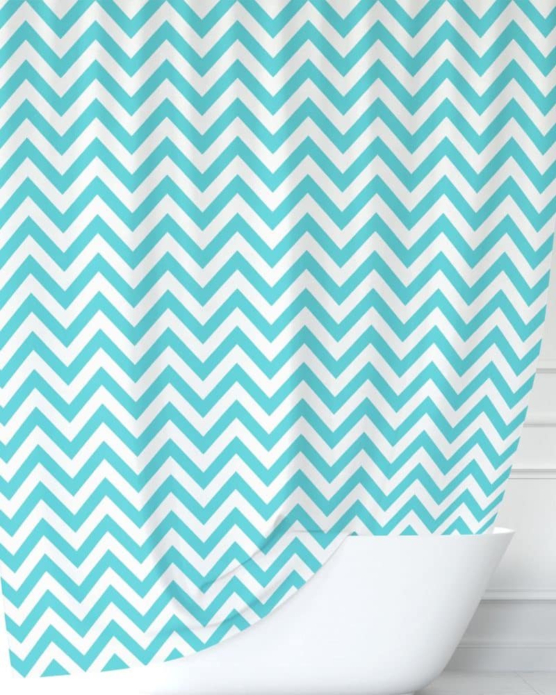 Teal and white chevron patterned shower curtain.