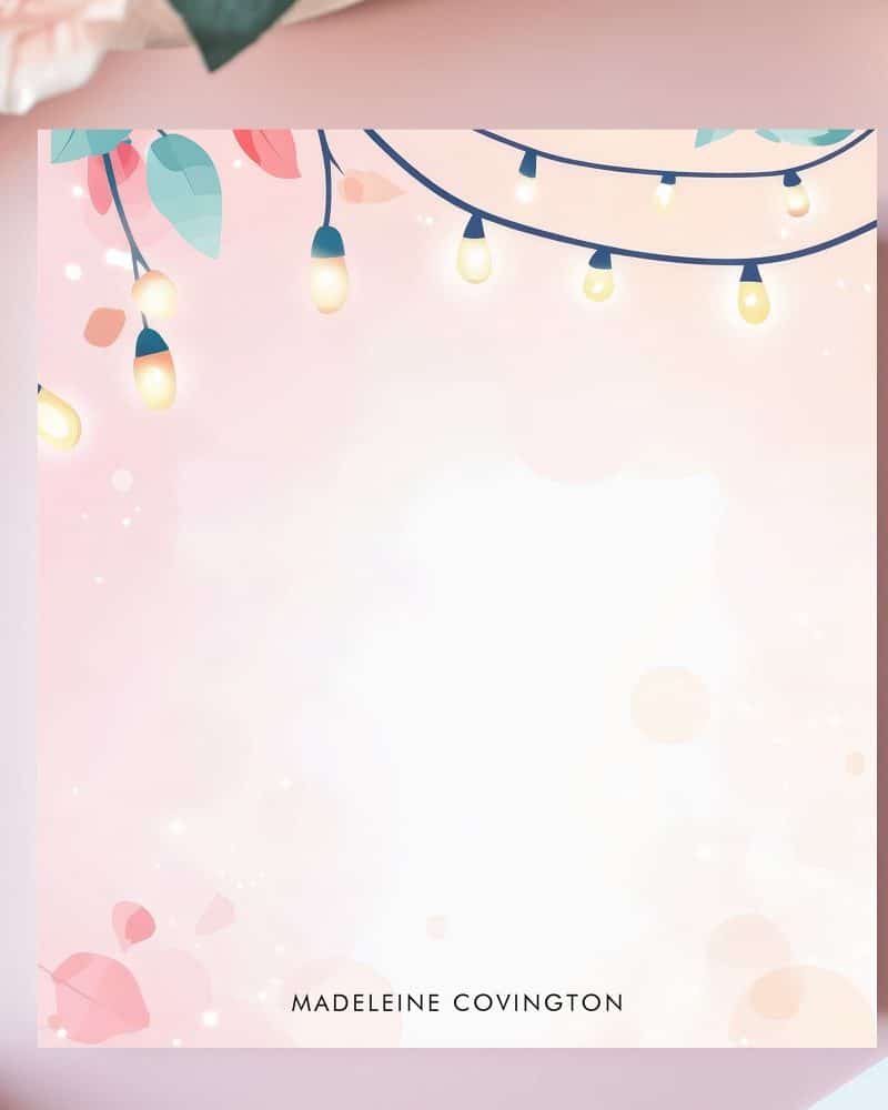 Pink stationery featuring string lights and leaves in the upper left corner.