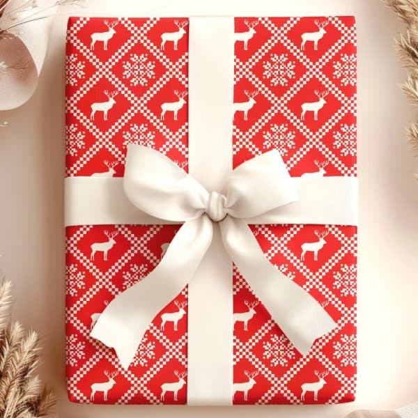 Red Gift Box With White Ribbon And Reindeer Pattern.