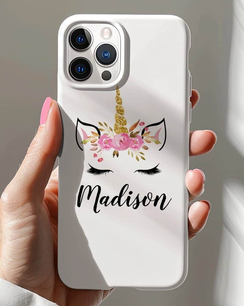 White iPhone case with a floral unicorn design and the name Madison.