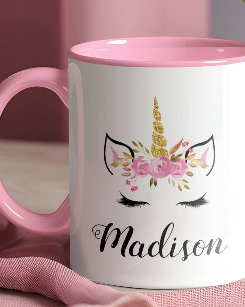 Pink mug with a unicorn face and the name Madison.