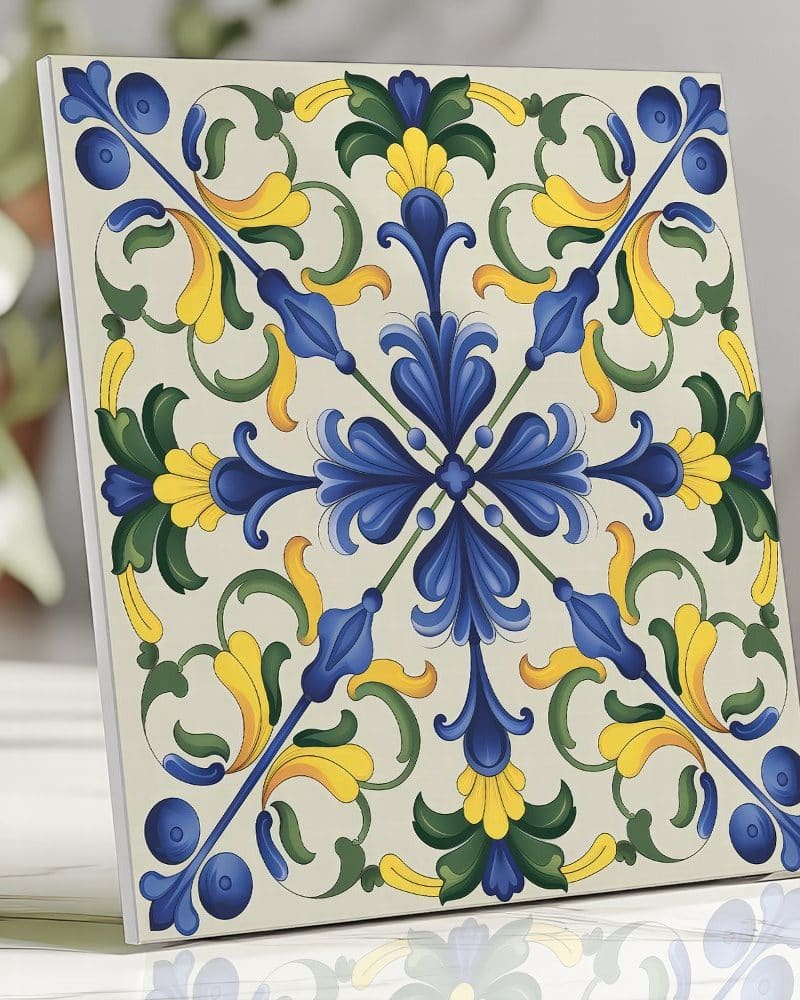 Square tile with a blue, yellow, and green floral design.