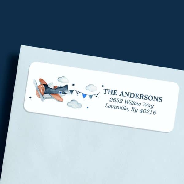 Return Address Label With A Watercolor Illustration Of A Small Airplane Flying Above Clouds And Bunting.