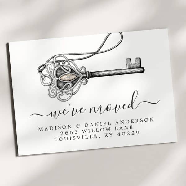 Ornate Key With &Quot;We'Ve Moved&Quot; Announcement And New Address.