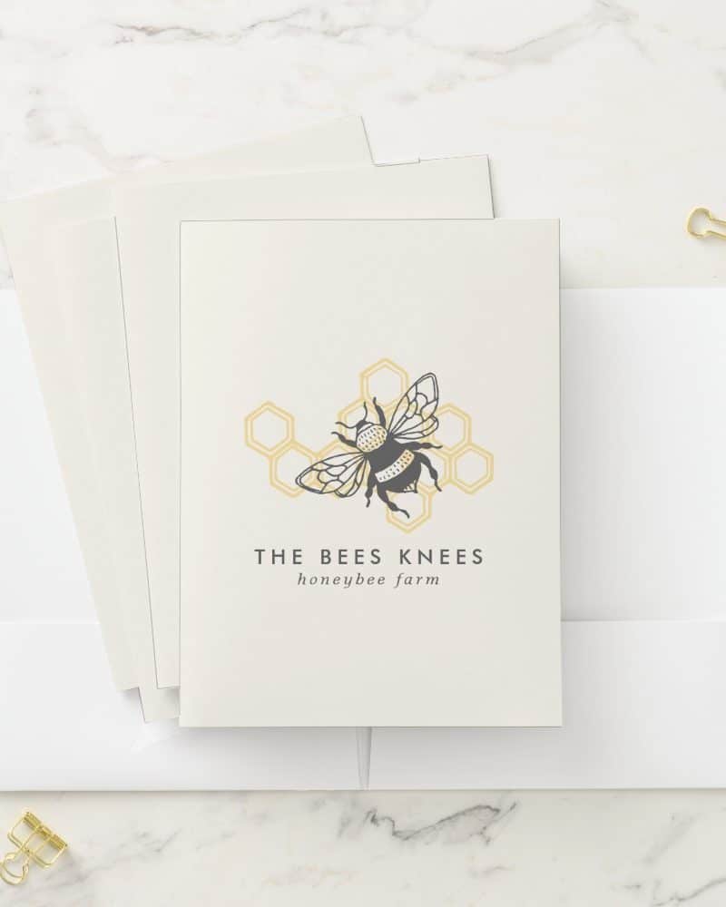 A honeybee farm logo featuring a bumblebee in a honeycomb. The Bees Knees honeybee farm is written below.