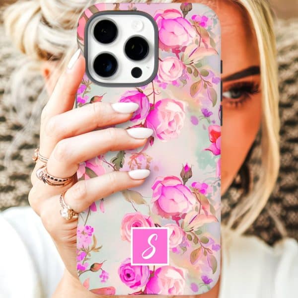 A Woman'S Hand Holds An Iphone Case Featuring A Watercolor Floral Design Of Pink Roses And A Pink Monogram S.