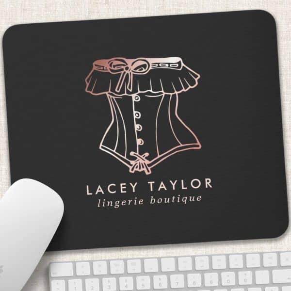 Black Mousepad With A Rose Gold Outline Drawing Of A Corset And The Text Lacey Taylor Lingerie Boutique.