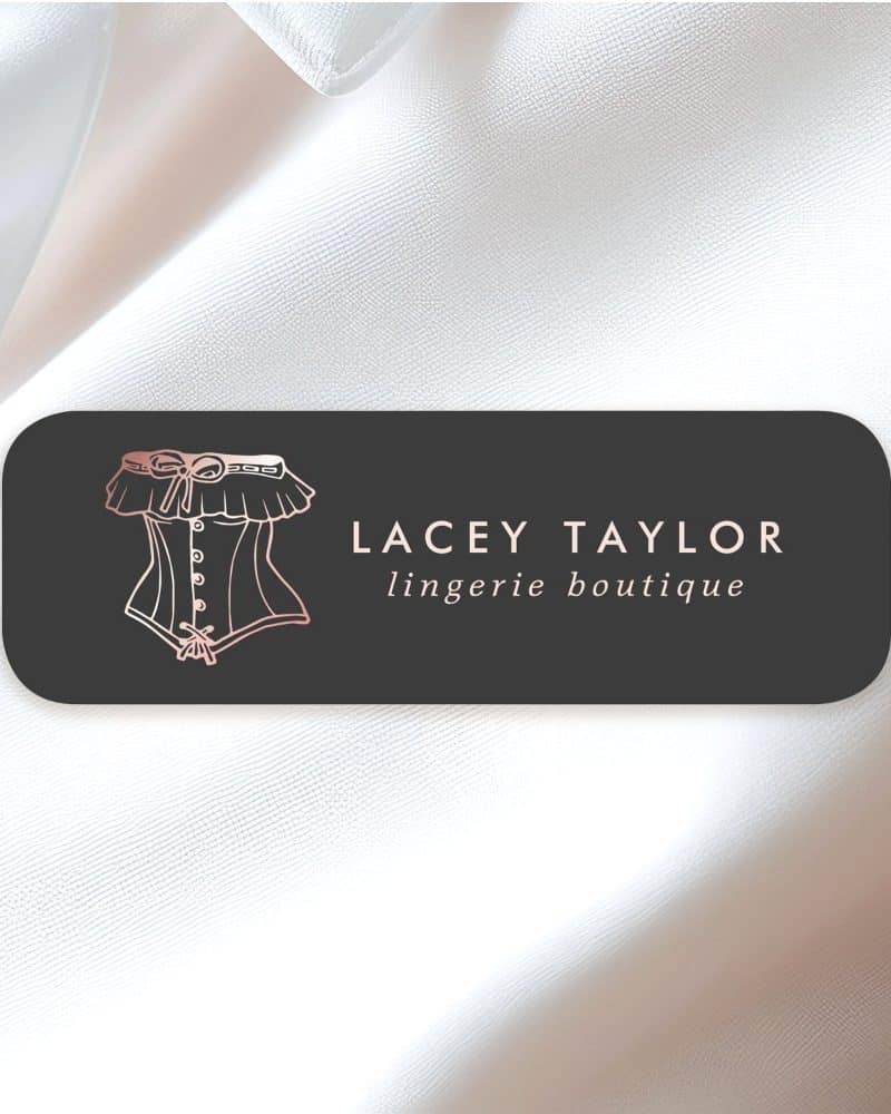 Rose gold corset logo on a dark rectangular banner, with the text Lacey Taylor lingerie boutique.
