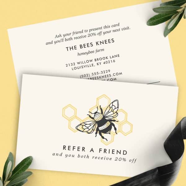 Referral Card For The Bees Knees Honeybee Farm Featuring A Bumblebee Illustration In A Honeycomb. The Card Offers 20% Off For Both The Referrer And Their Friend.