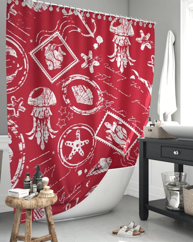 Red shower curtain with a white nautical design featuring starfish, jellyfish, seashells, and postage stamps.