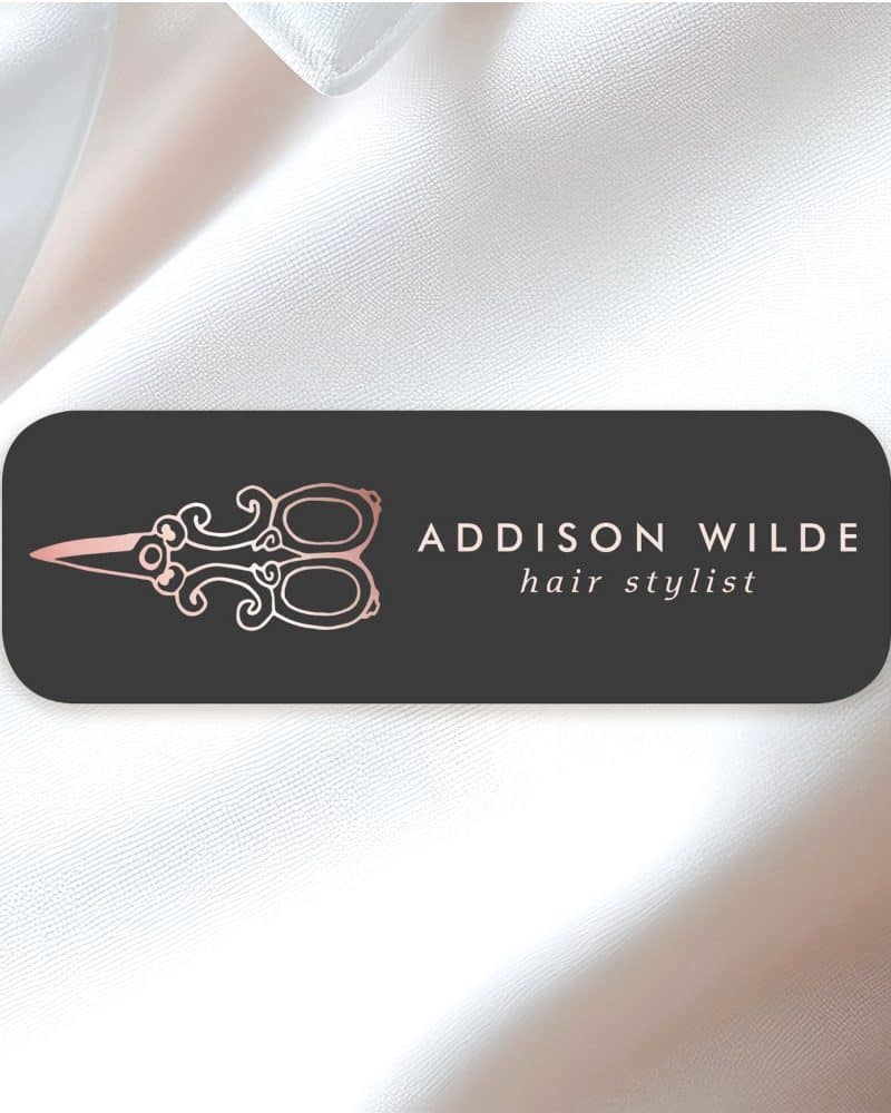 Addison Wilde hair stylist logo featuring rose gold scissors on a black rectangle.