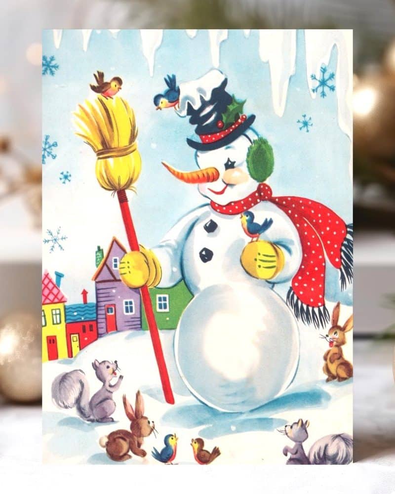 A cheerful snowman holding a broom, surrounded by small animals and birds in a snowy village setting.