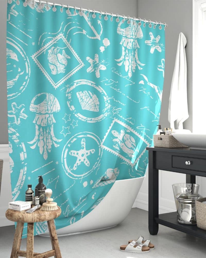Teal shower curtain with a white sea life and postage stamp design.