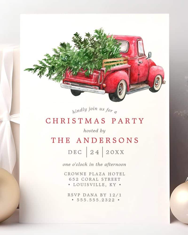 Christmas party invitation featuring a watercolor painting of a red truck carrying a Christmas tree.