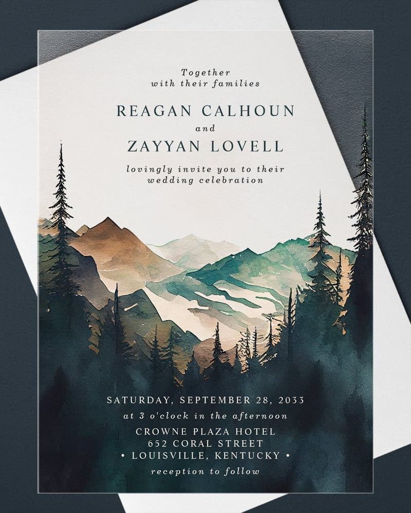 Wedding invitation with watercolor mountain and forest scene.