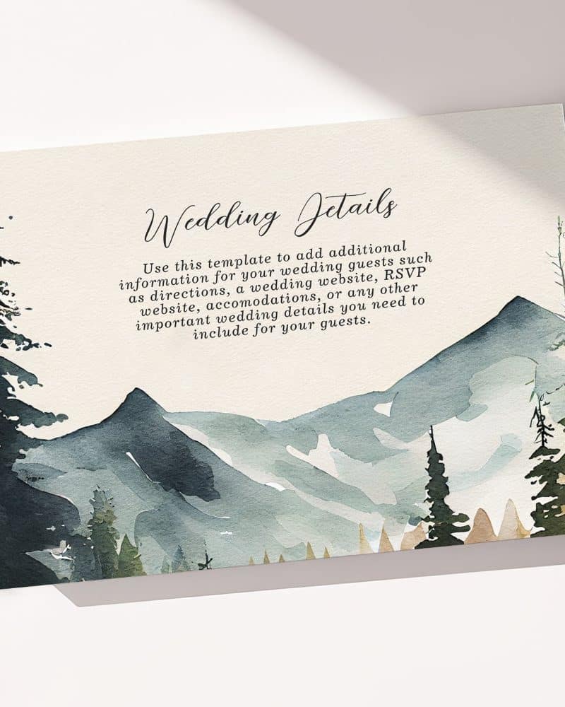 Wedding details card with watercolor mountain and forest landscape.