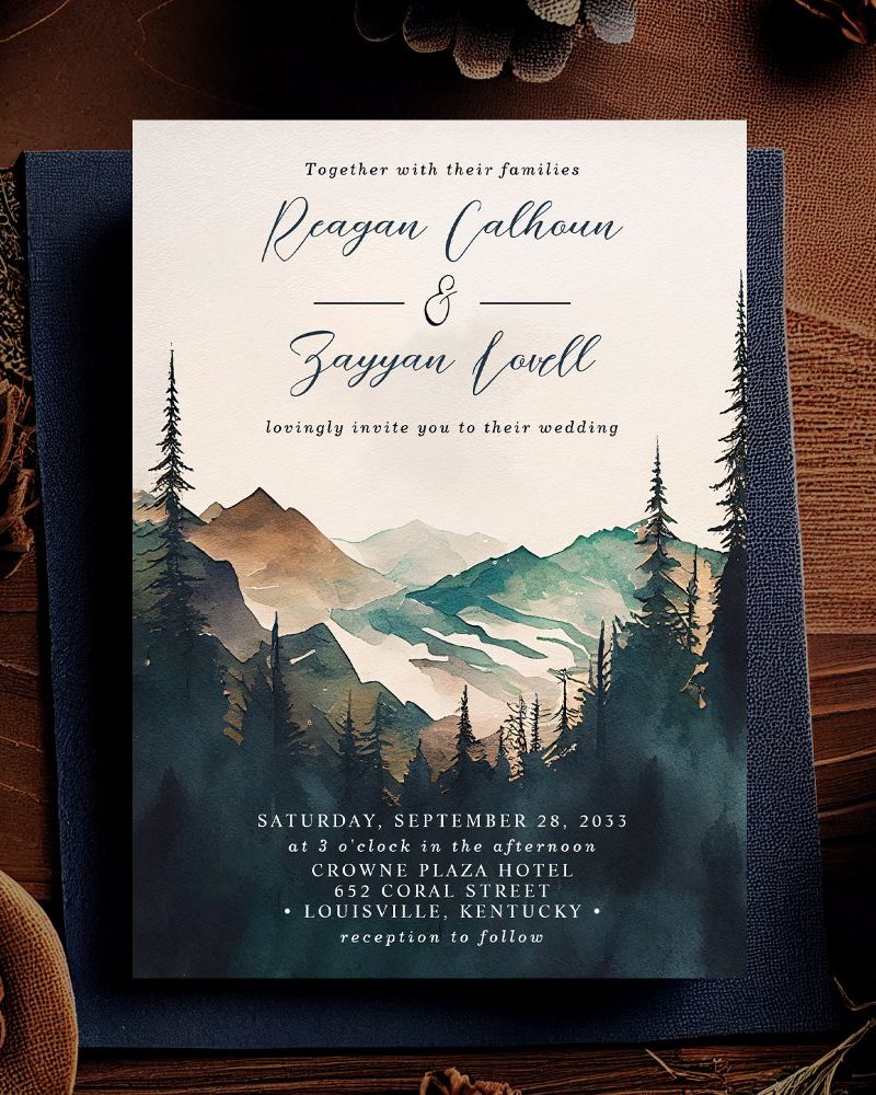 Wedding invitation featuring a watercolor painting of mountains and pine trees.