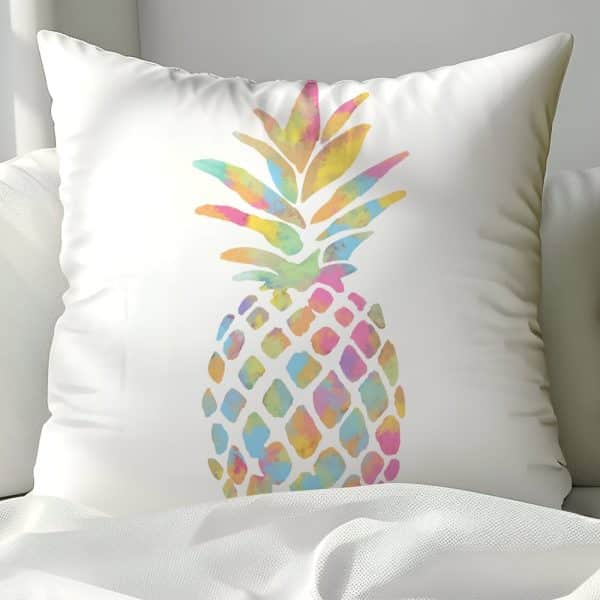 White Pillow With A Pastel Watercolor Pineapple Design.