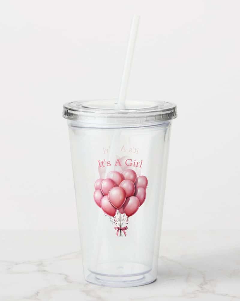 Clear plastic tumbler with a straw, featuring a pink balloon bouquet and the text It's A Girl.