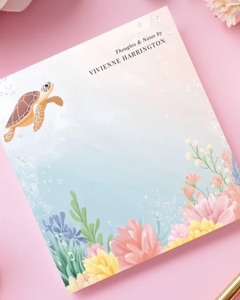Sea turtle notepad with underwater floral border.
