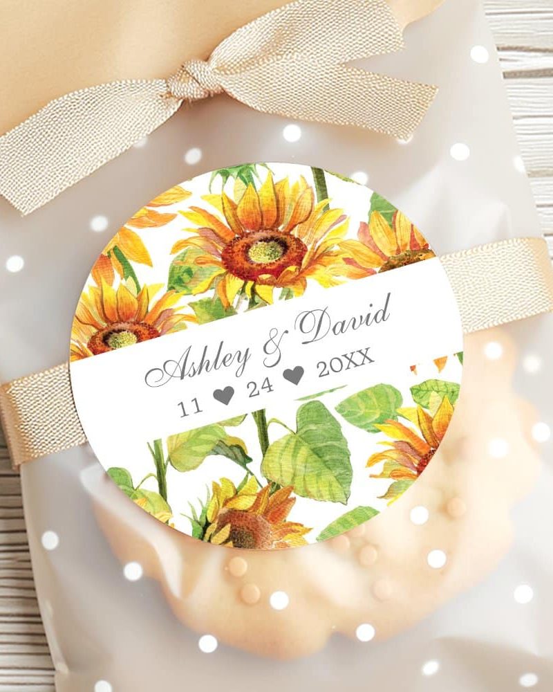 A round wedding favor tag featuring sunflowers with Ashley & David's wedding date.