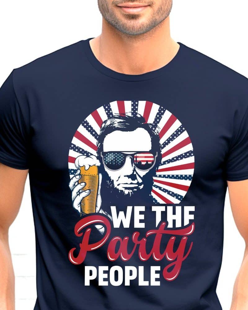 Navy blue t-shirt featuring Abraham Lincoln wearing sunglasses and holding a beer, set against a red, white, and blue sunburst with the text We the Party People.