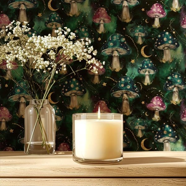 A Lit Candle Sits On A Wooden Surface In Front Of A Dark Green Wallpaper Featuring A Repeating Pattern Of Whimsical Mushrooms And Crescent Moons.