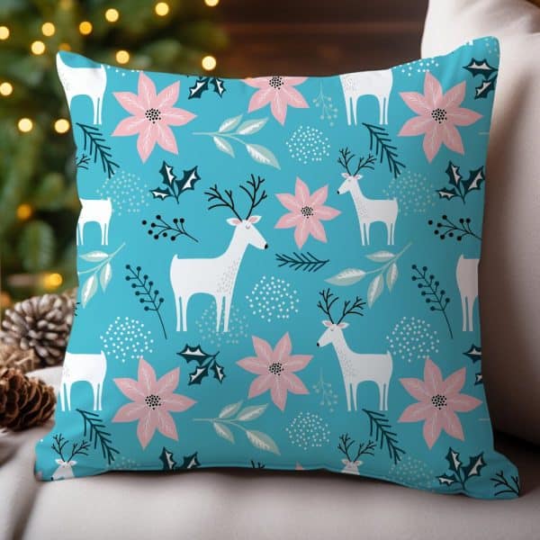 Teal Decorative Pillow With A Repeating Pattern Of White Reindeer And Pink Poinsettias.