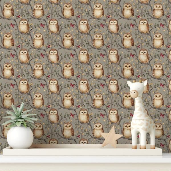A Shelf Displays A Taupe Owl-Themed Wallpaper Featuring Numerous Owls Perched On Branches With Berries. A Small Wooden Giraffe And Star Are Also On The Shelf.