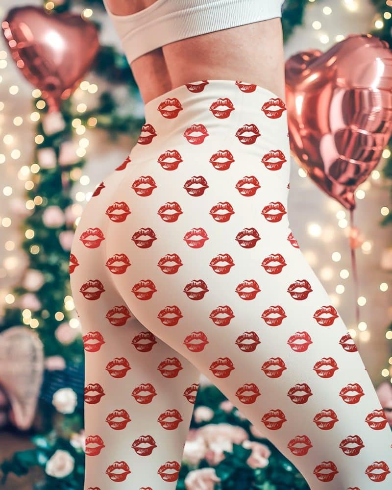 White leggings with a repeating pattern of red lips.