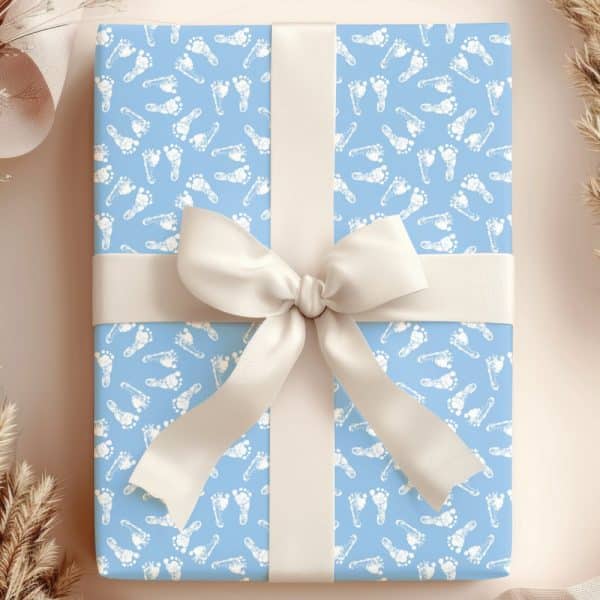 Light Blue Gift Box With White Baby Footprints And A Cream-Colored Ribbon.