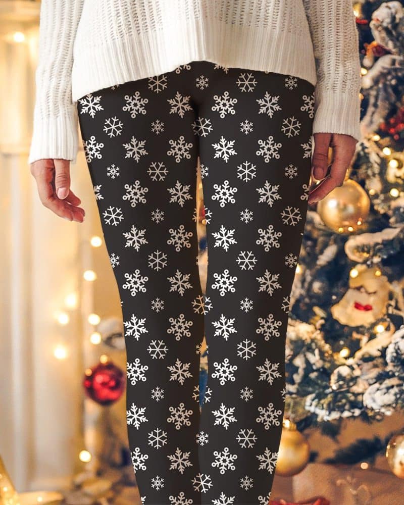 Dark leggings with a white snowflake pattern.