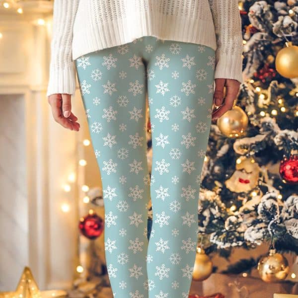 Light Blue Leggings With A White Snowflake Pattern.