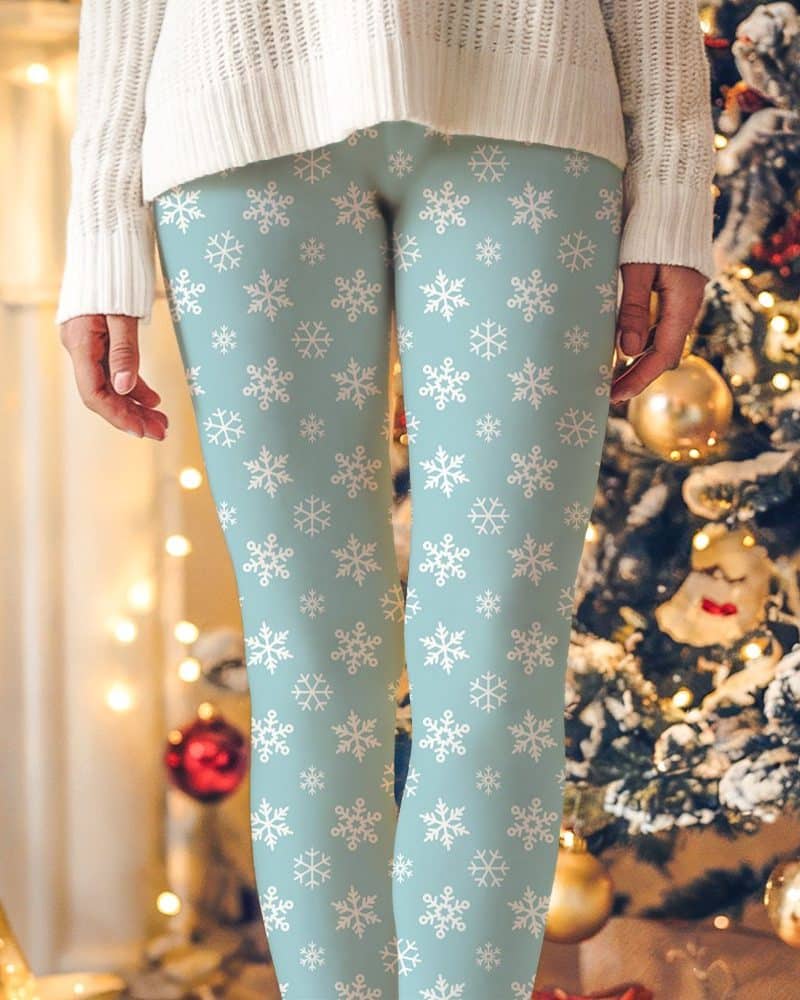 Light blue leggings with a white snowflake pattern.