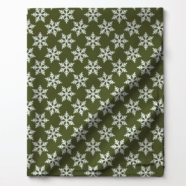 Olive Green Fabric With A Repeating Pattern Of White Snowflakes.