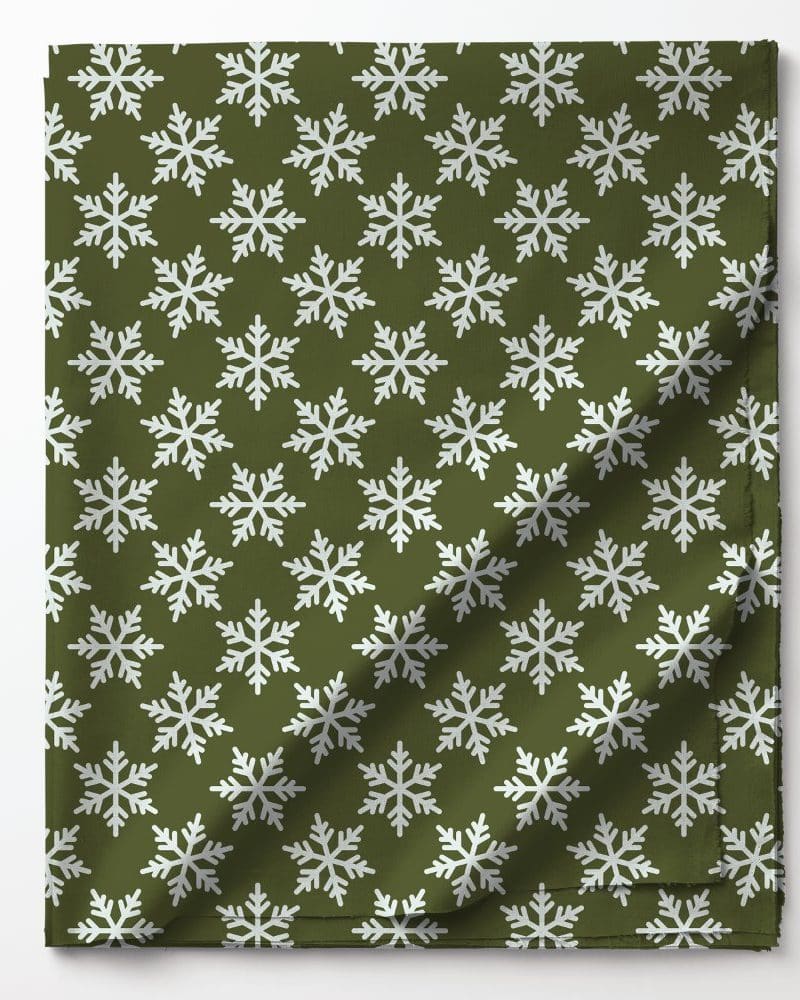 Olive green fabric with a repeating pattern of white snowflakes.