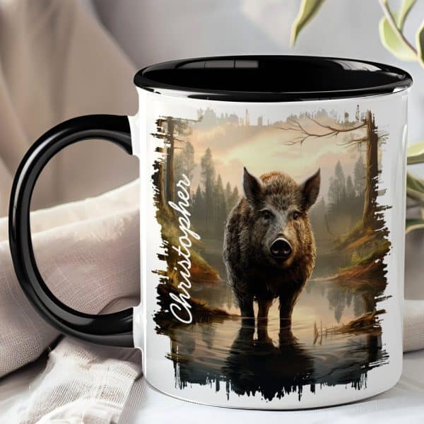 White Coffee Mug With Black Handle And Interior, Featuring A Boar In A Forest Reflecting In Water. The Name Christopher Is Printed On The Side.